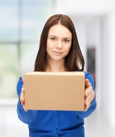 picture of woman handing box back
